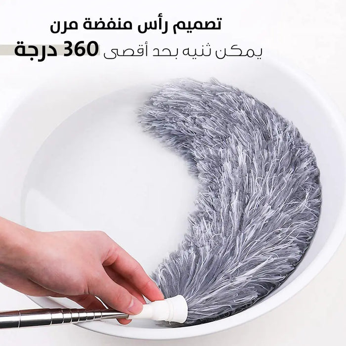 منفضة غبار مع عصا قابلة للتحكم بالطولThe Dust Cleaning Stick Is Adjustable In Length -  