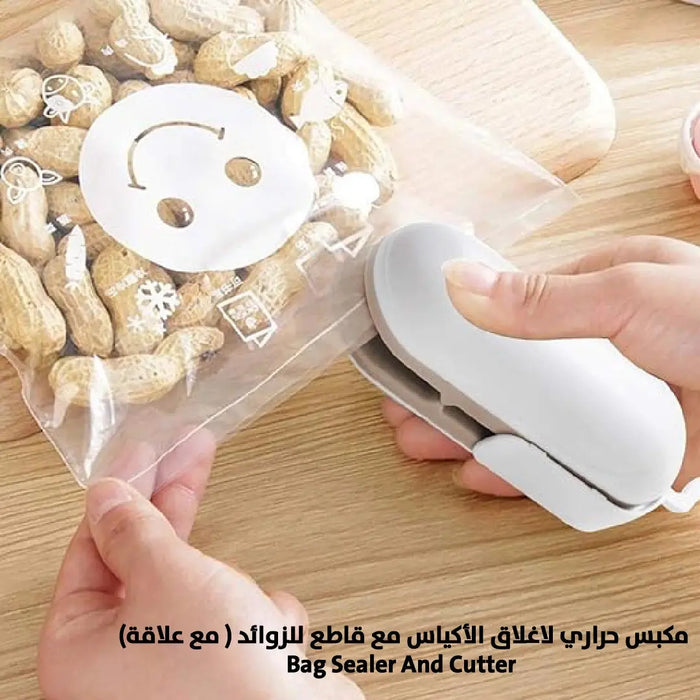 مكبس حراري لاغلاق الأكياس مع قاطع للزوائد ( مع علاقة) Bag Sealer And Cutter -  